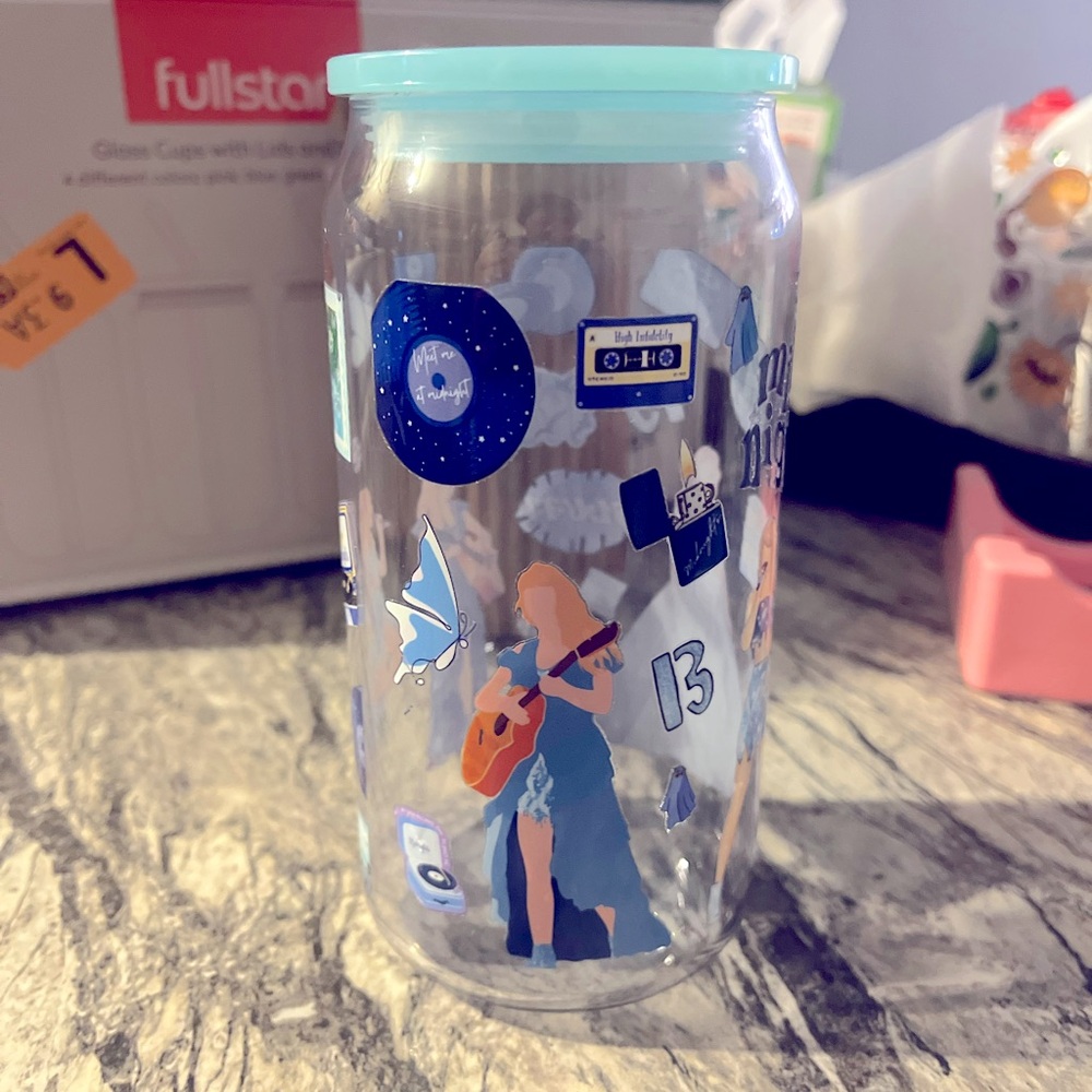 Clear Glass Tumbler with Blue Lid and Graphic Design